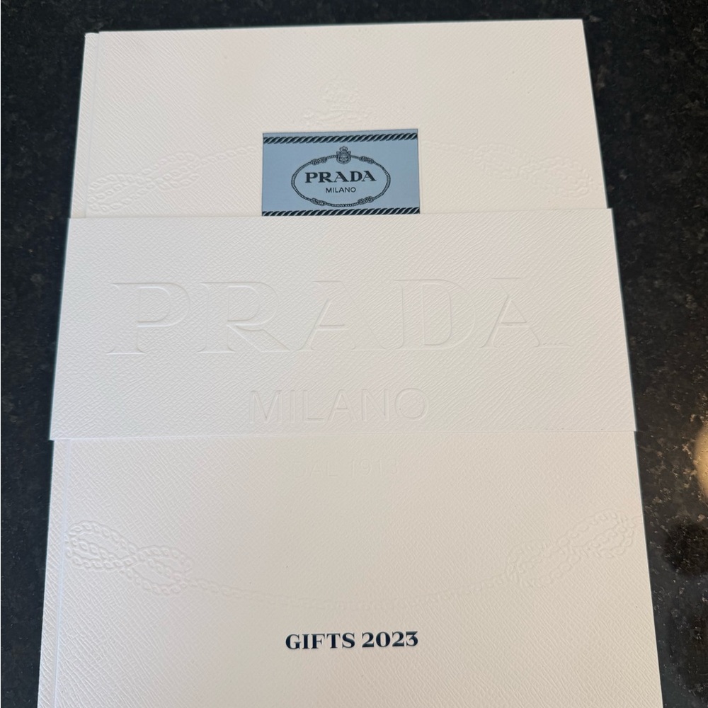 Prada White magazine and 2 clothing bags *Authentic*